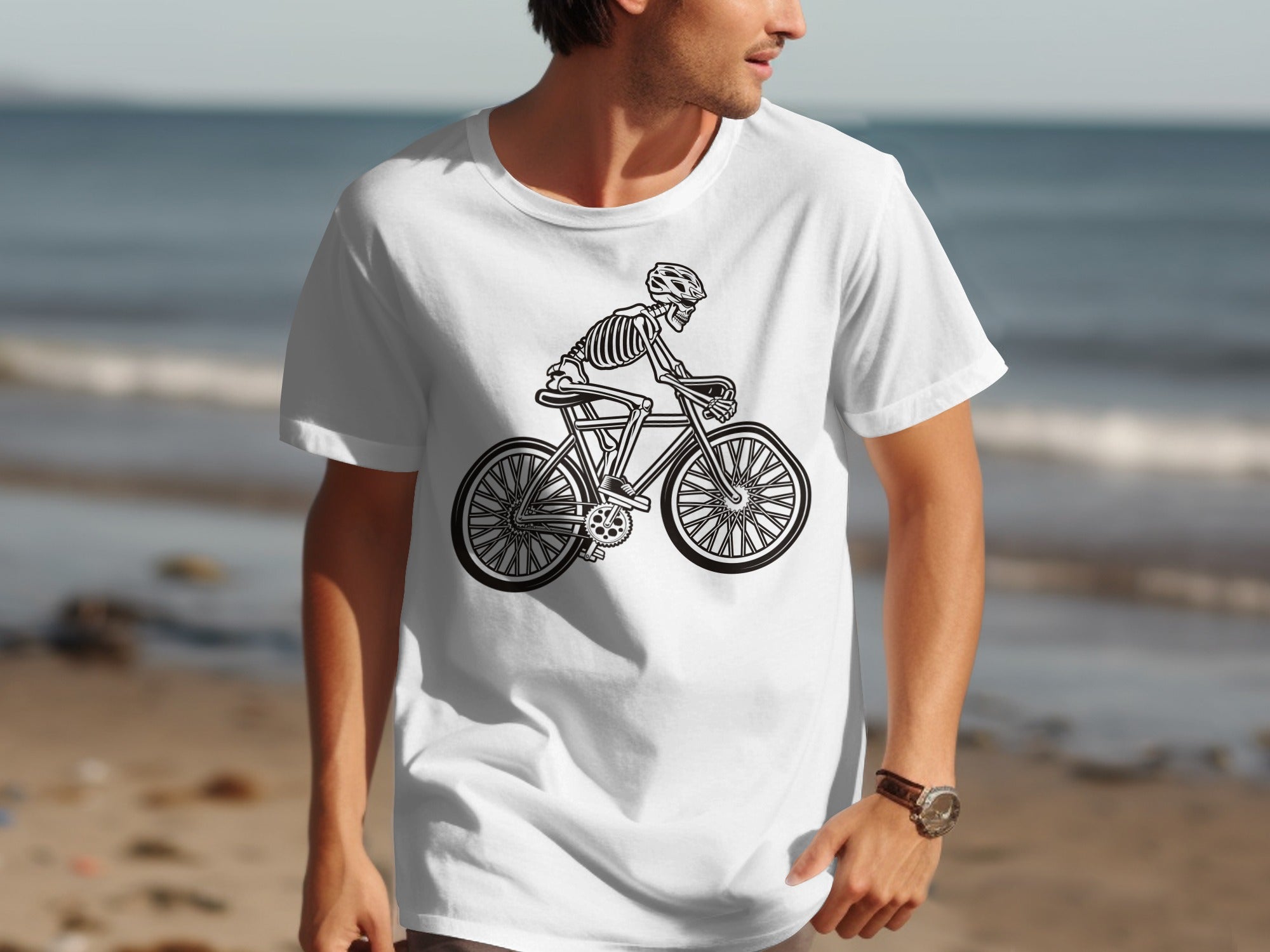 T-shirt with a black and white graphic of a skeleton riding a bicycle.