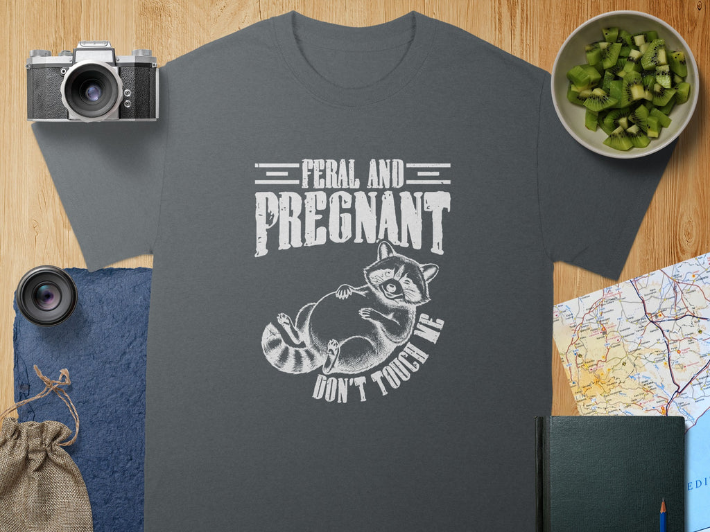 Shirt with "Feral and Pregnant" and raccoon graphic.