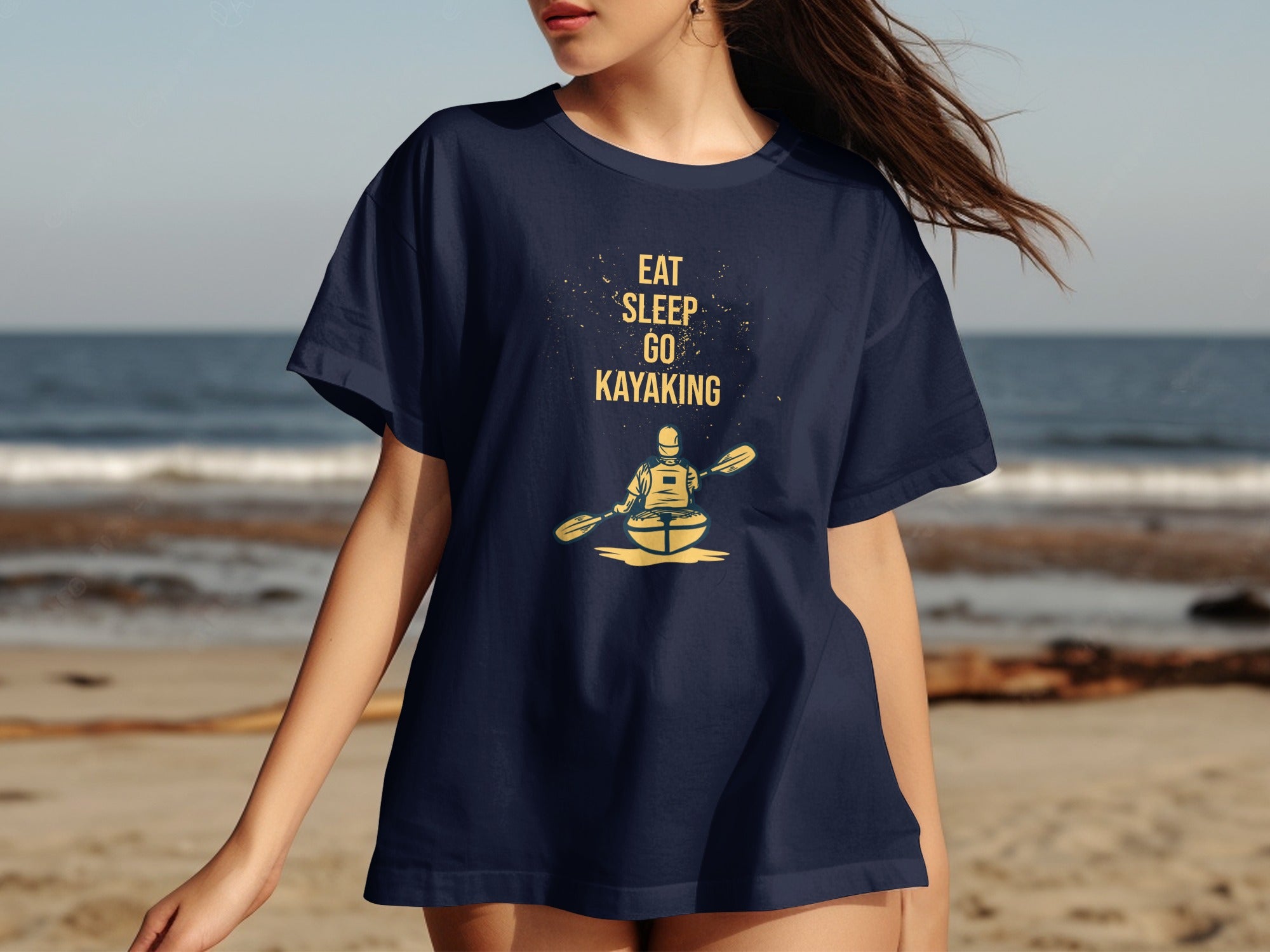 Navy t-shirt with yellow text and graphic of a kayaker.