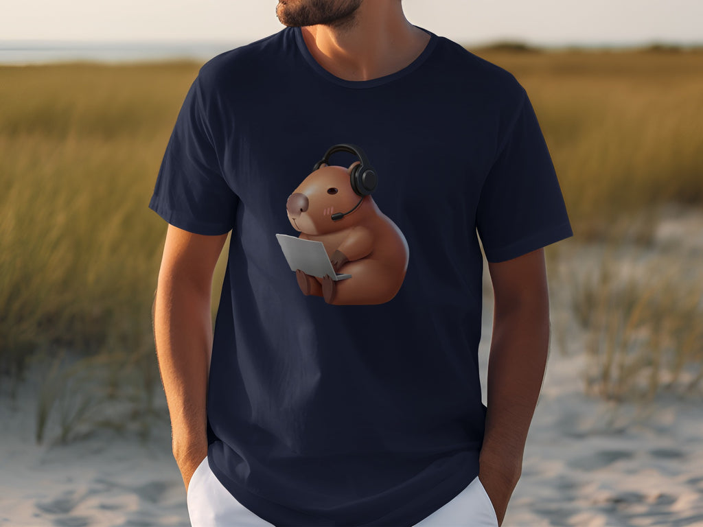 Navy t-shirt with capybara wearing headset holding laptop graphic