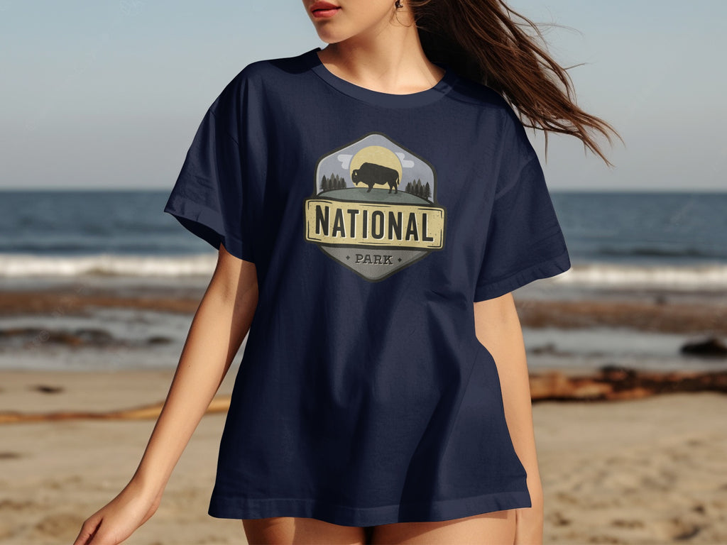 Navy t-shirt with "National Park" text and bison graphic on beach background