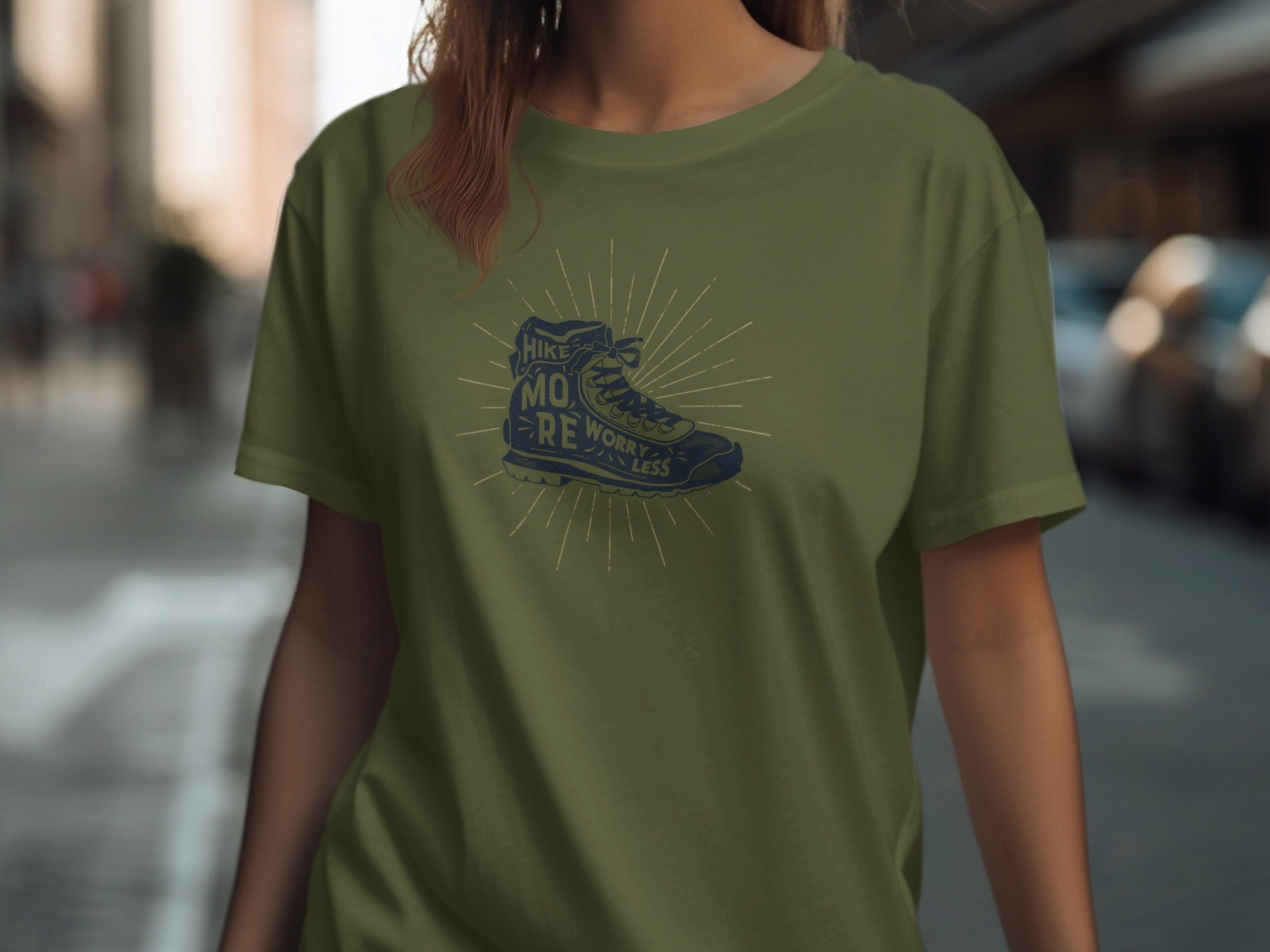 Olive t-shirt with vintage hiking boot graphic and text "Hike More Worry Less".