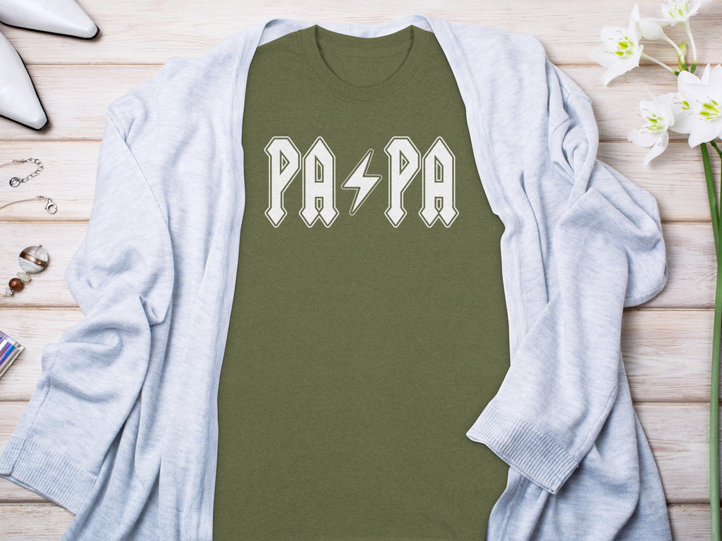 Green t-shirt with white "PAPA" text and a lightning bolt.