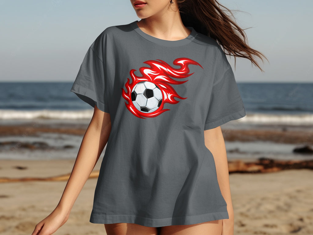 Grey t-shirt with a soccer ball engulfed in red flames graphic on the front.