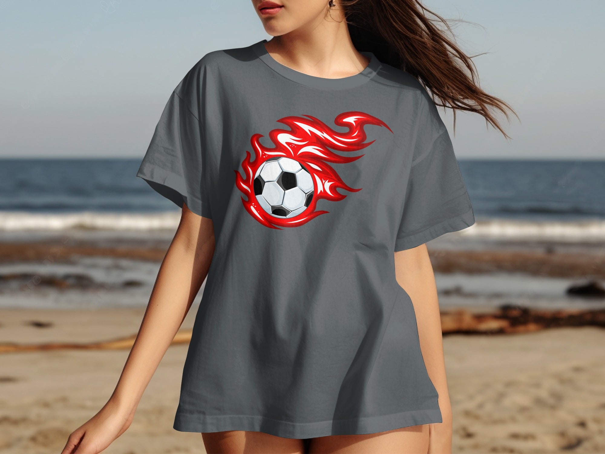 Grey t-shirt with a soccer ball engulfed in red flames graphic on the front.