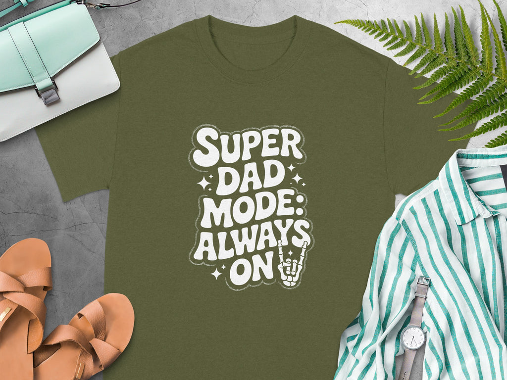 Green t-shirt with white text "Super Dad Mode: Always On" and skeleton hand.