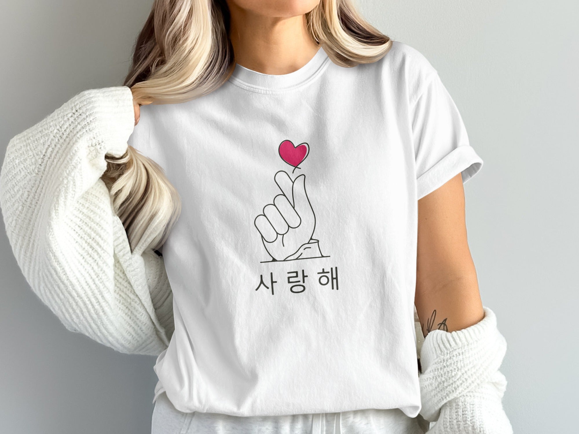 White t-shirt with a Korean hand gesture and "사랑해" text.