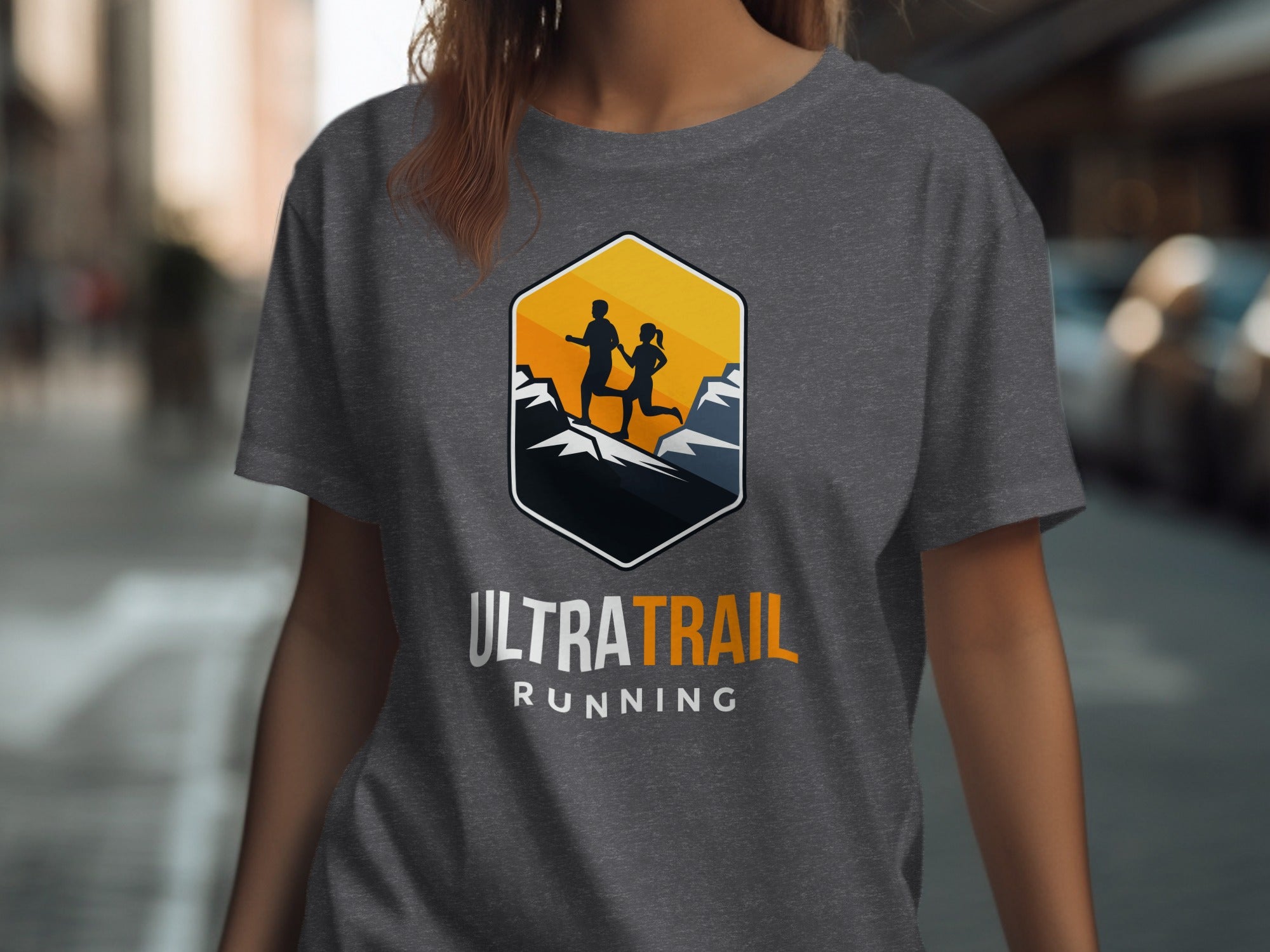 Grey t-shirt with "ULTRA TRAIL RUNNING" logo featuring two runners on a mountain.