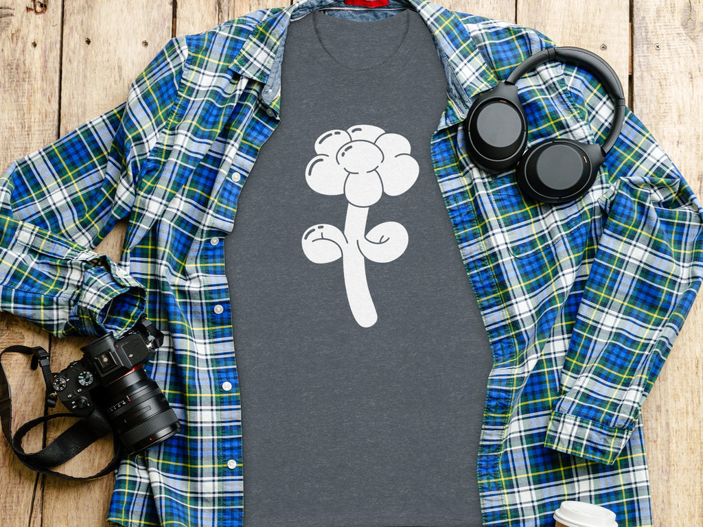 Charcoal t-shirt with a white balloon flower graphic, layered under an open blue plaid shirt.