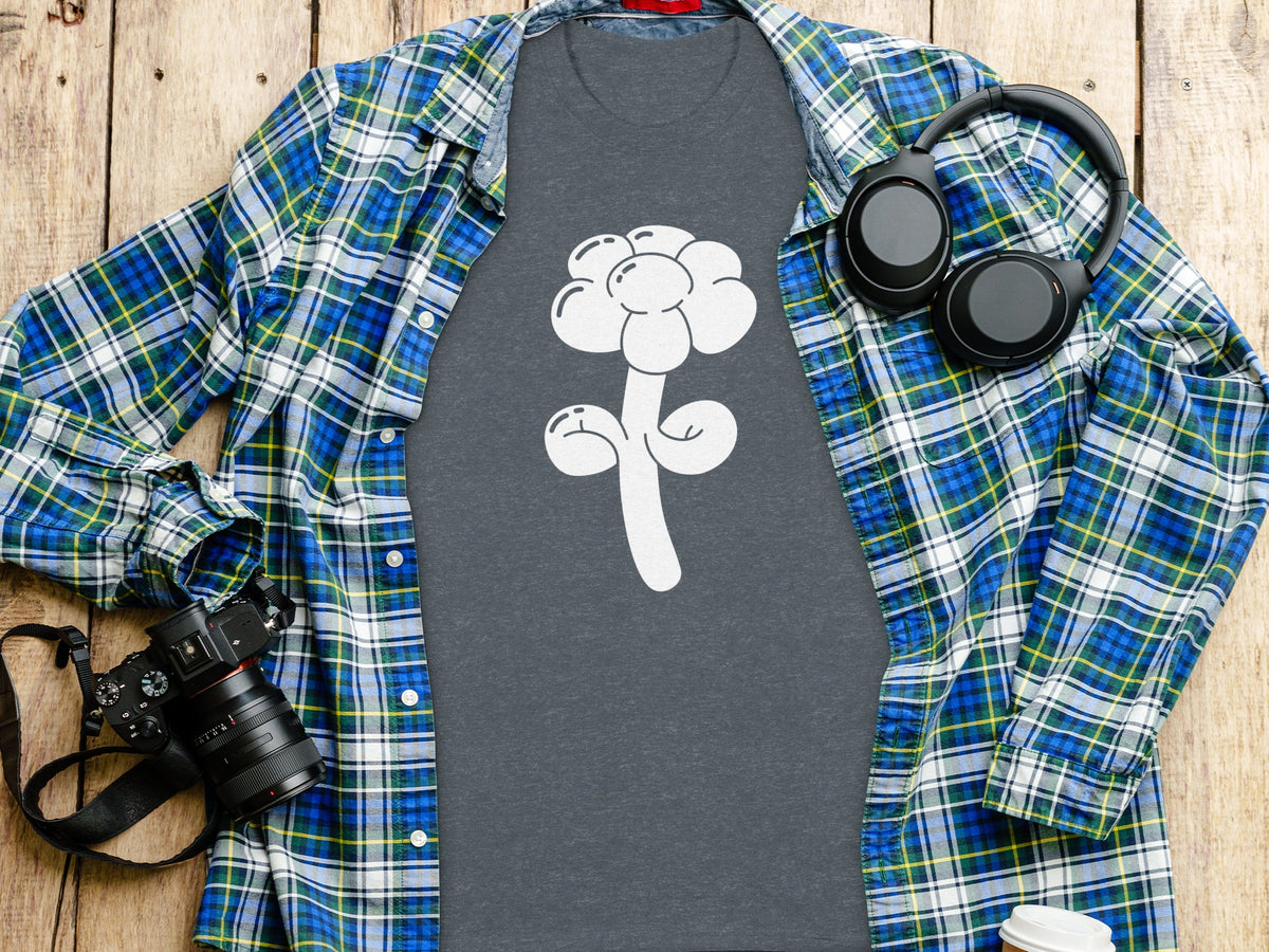 Charcoal t-shirt with a white balloon flower graphic, layered under an open blue plaid shirt.