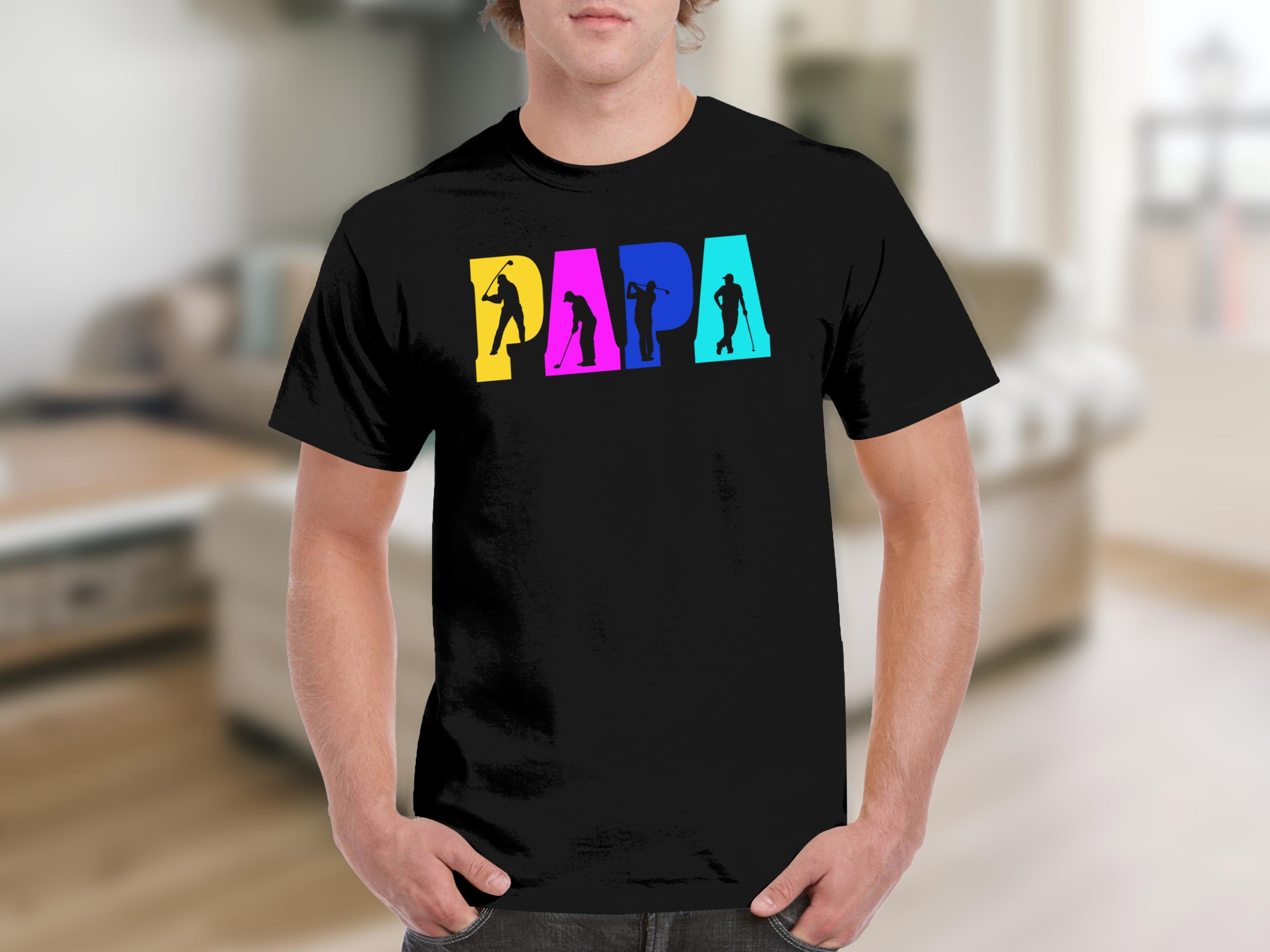 Black t-shirt with colorful "PAPA" text graphic featuring golfer silhouettes.