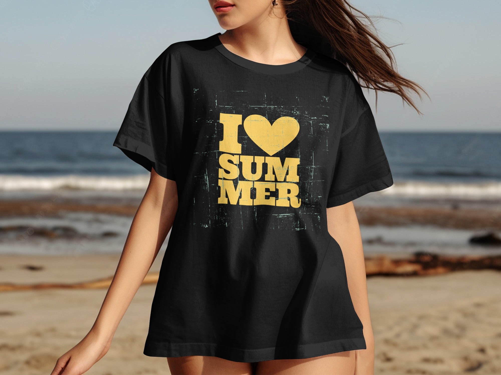Black t-shirt with yellow text "I ❤️ SUMMER" on a beach background.