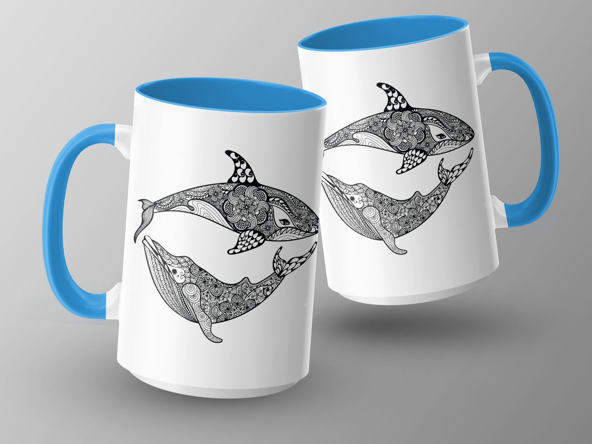 Two white mugs with blue handles feature black line art of whales and orcas.