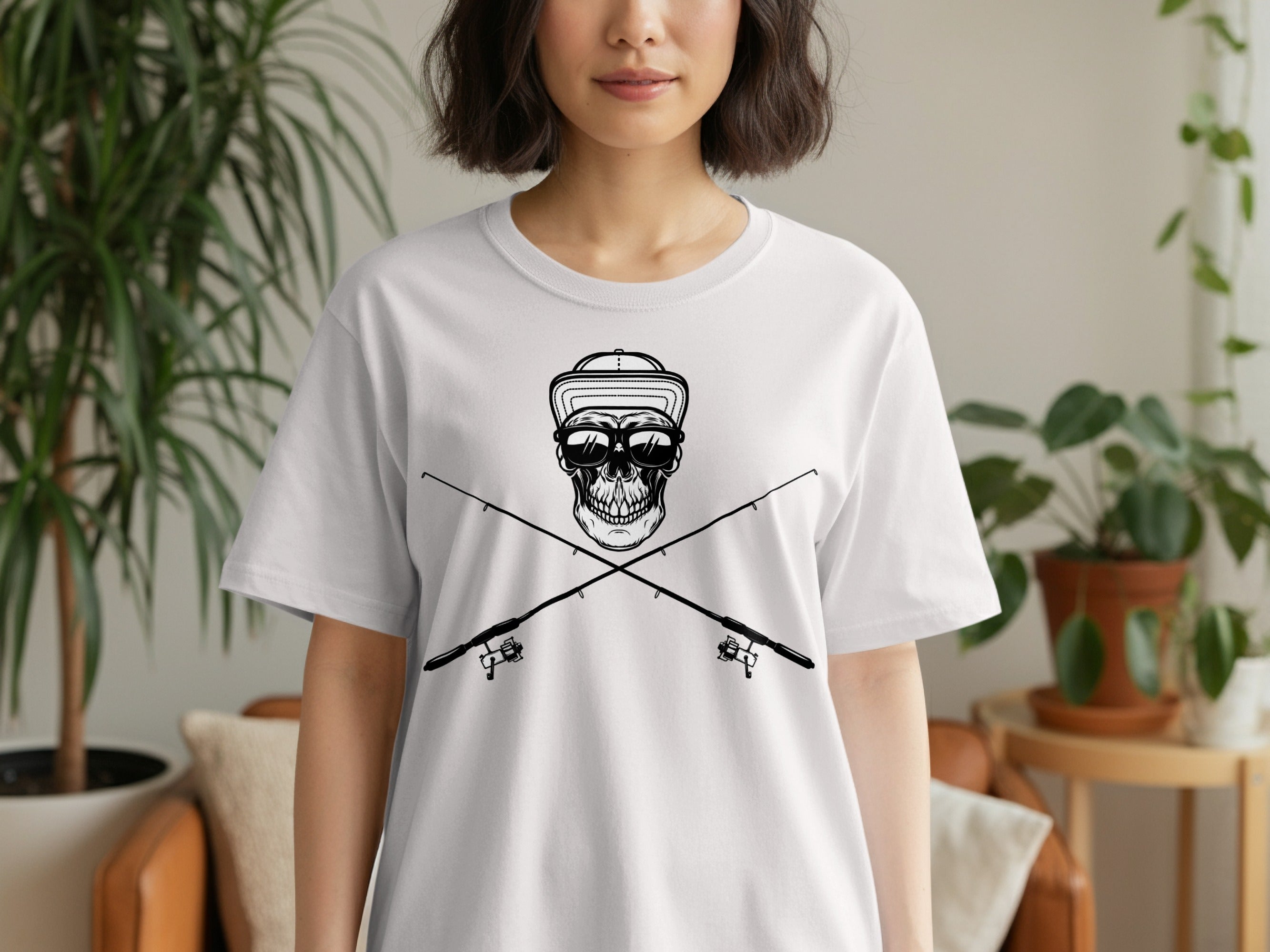 Skull wearing sunglasses and a hat, crossed over fishing rods on a white t-shirt.