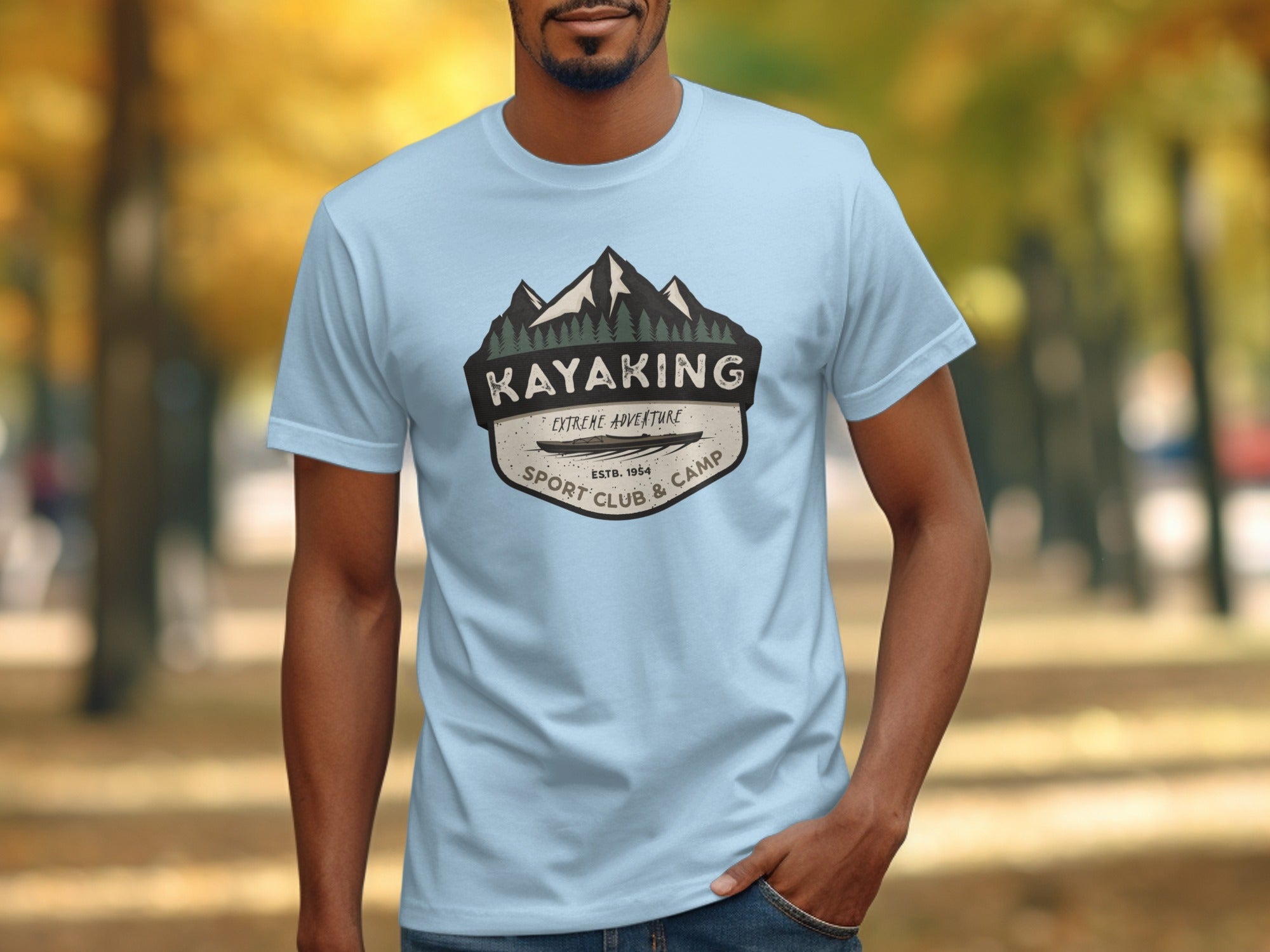 Light blue t-shirt with Kayaking Extreme Adventure Sport Club logo.