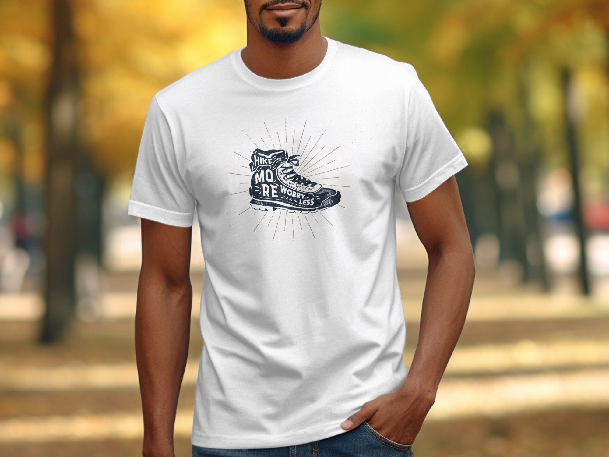 White t-shirt with "Hike More Worry Less" text on a boot graphic.