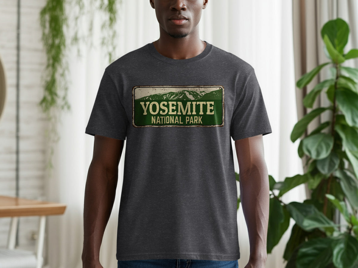 Dark grey t-shirt with vintage Yosemite National Park emblem on chest.