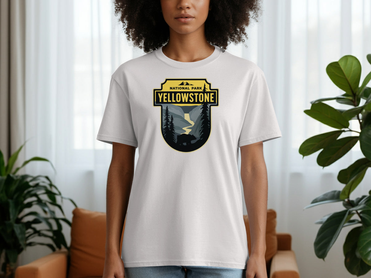 White t-shirt with a Yellowstone National Park graphic featuring a bear and river.