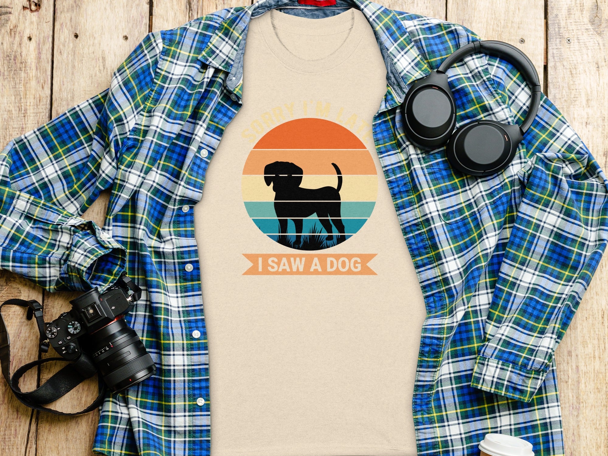 Beige t-shirt with black dog silhouette and text "Sorry I'm late I saw a dog".