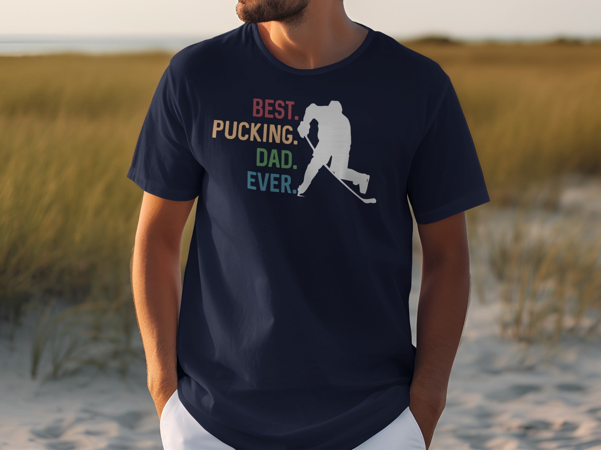 Navy t-shirt with "BEST. PUCKING. DAD. EVER." and hockey player graphic.