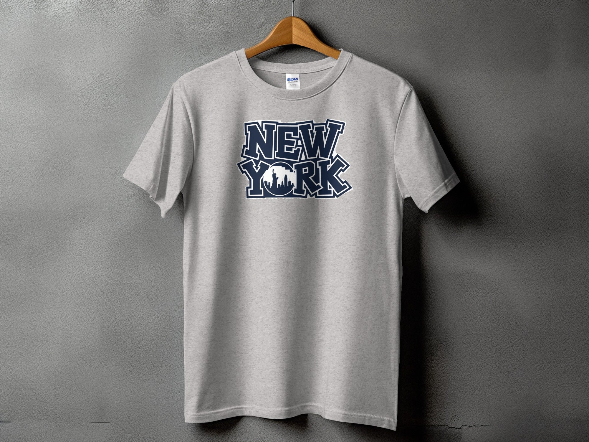 Grey t-shirt with navy blue "New York" text and skyline silhouette.