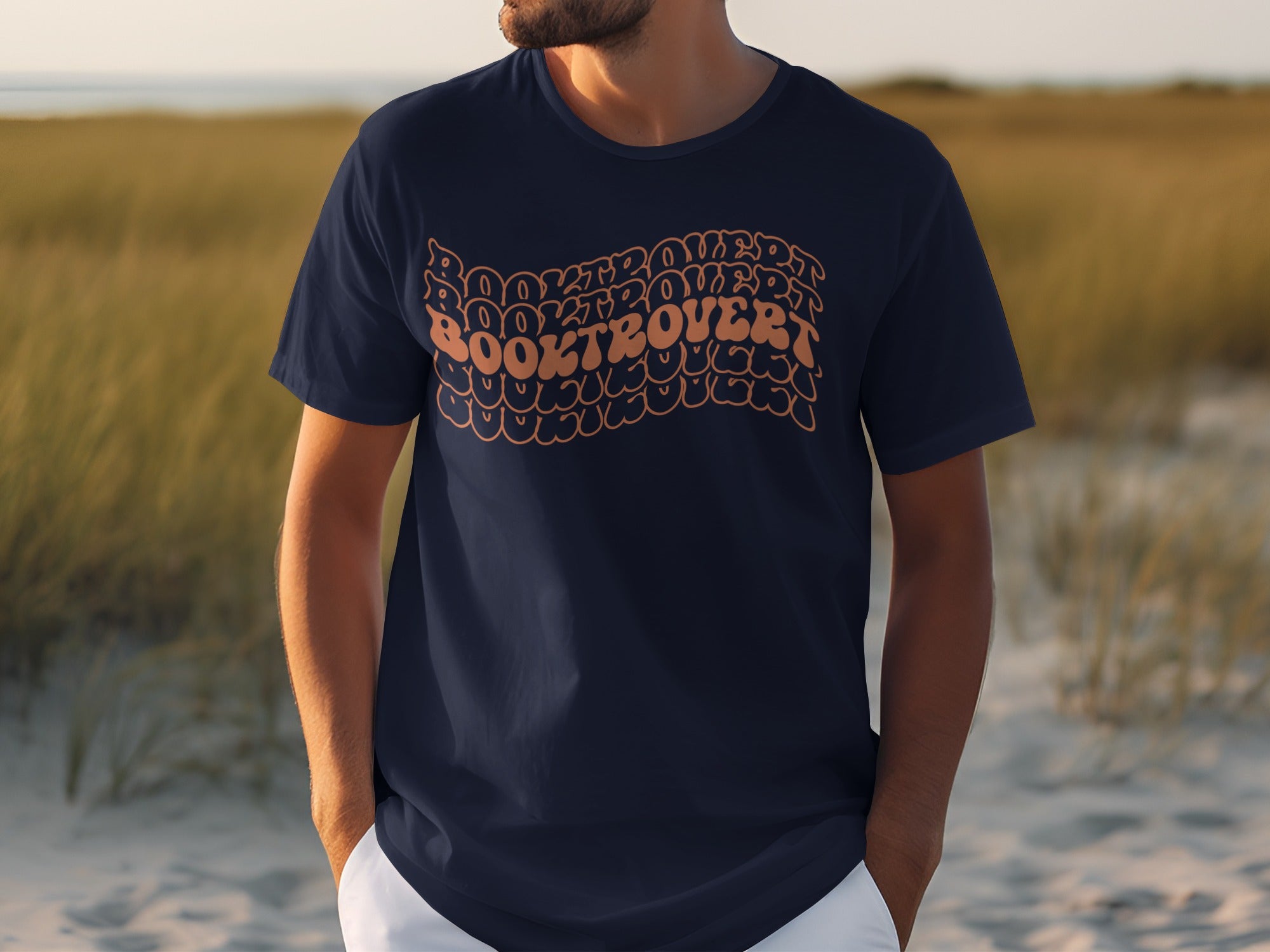 Dark blue t-shirt with "BOOKTROVERT" in wavy, bubble-like lettering.