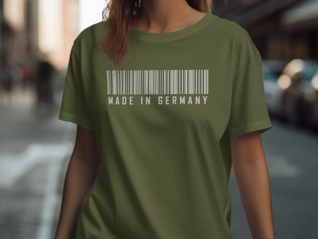Green t-shirt with a white barcode graphic and "MADE IN GERMANY" text.