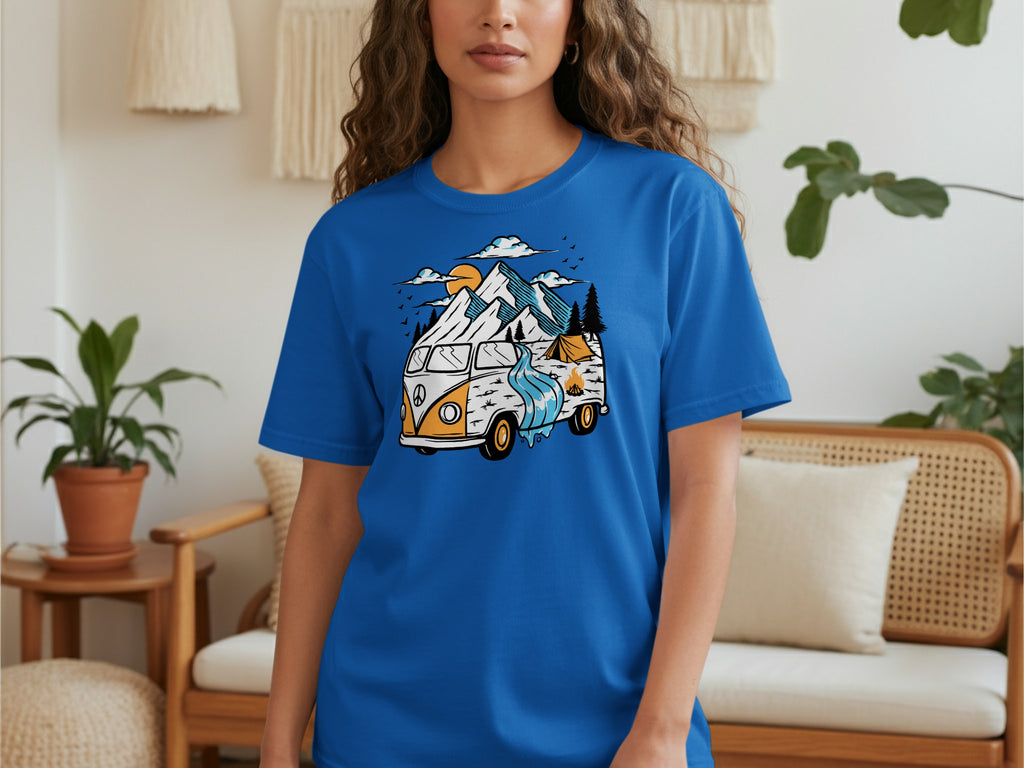 Blue t-shirt with a vintage camper van, mountains, and a stream graphic.