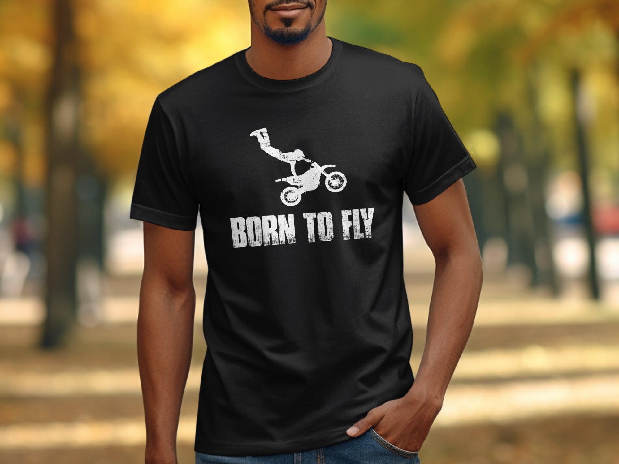 Black t-shirt with motocross rider doing a trick and "BORN TO FLY" text.