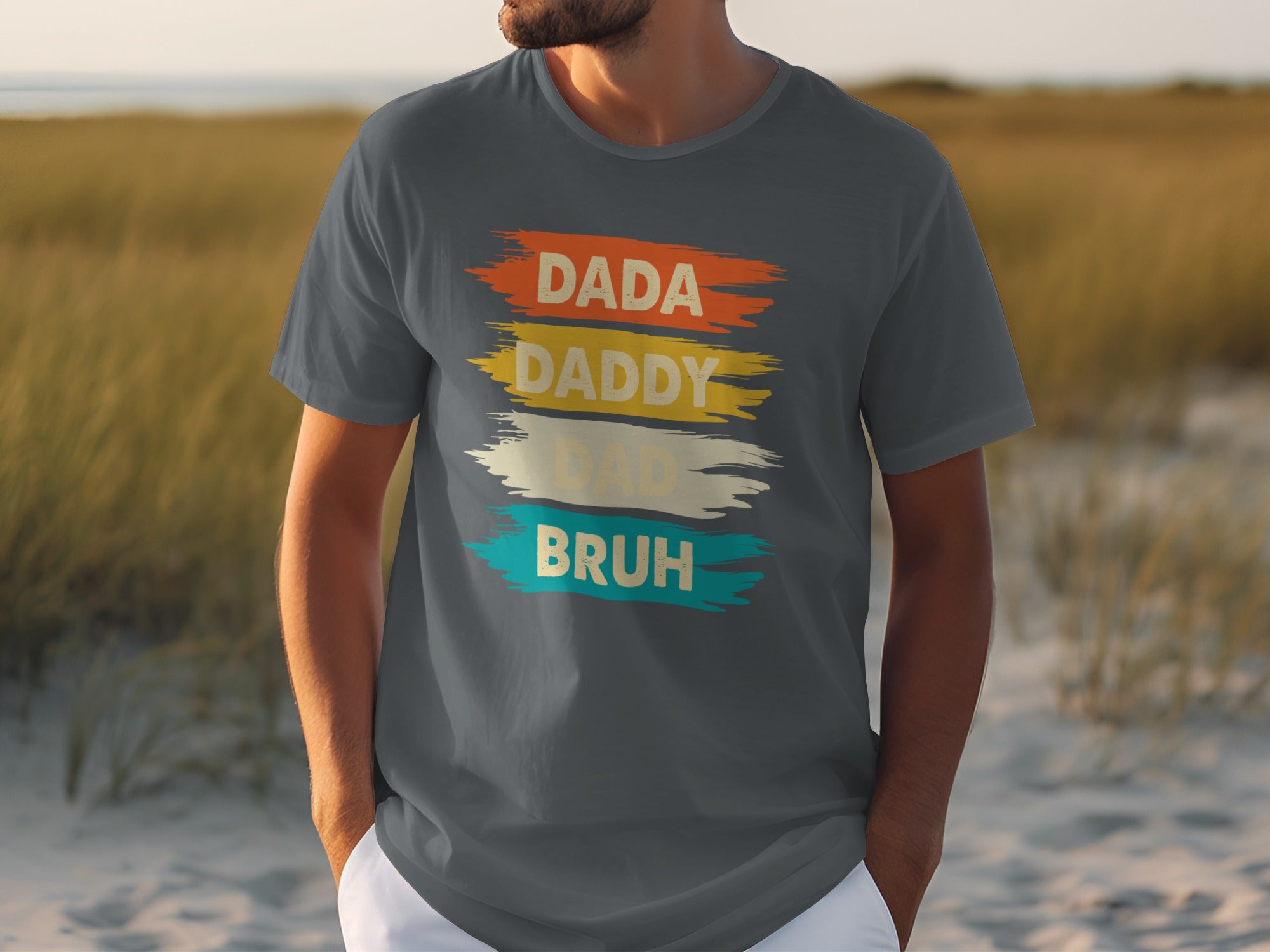 Dark grey t-shirt with "DADA DADDY DAD BRUH" text.
