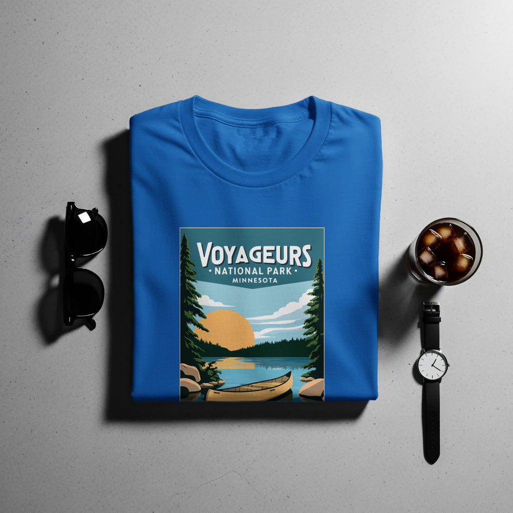 Blue t-shirt with Voyageurs National Park Minnesota graphic and canoe on lake.