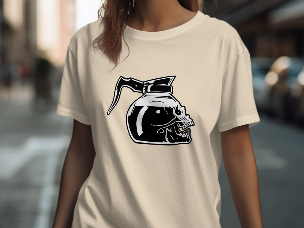 Black and white skull coffee pot graphic on a cream t-shirt.