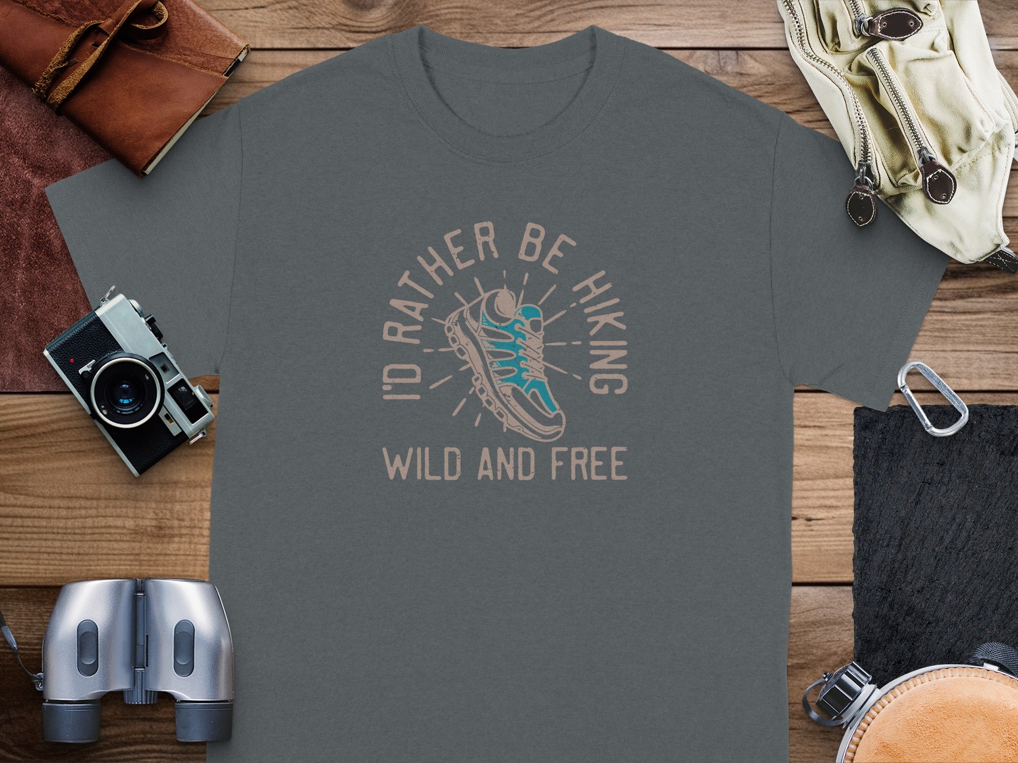 Grey t-shirt with "I'd Rather Be Hiking Wild and Free" text and boot graphic.