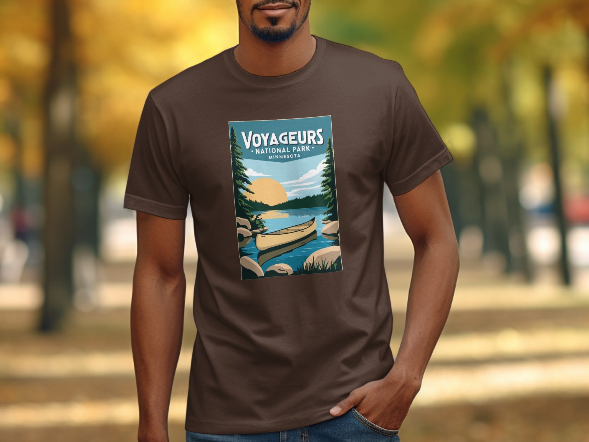 Voyageurs National Park Minnesota graphic on brown t-shirt with canoe on lake