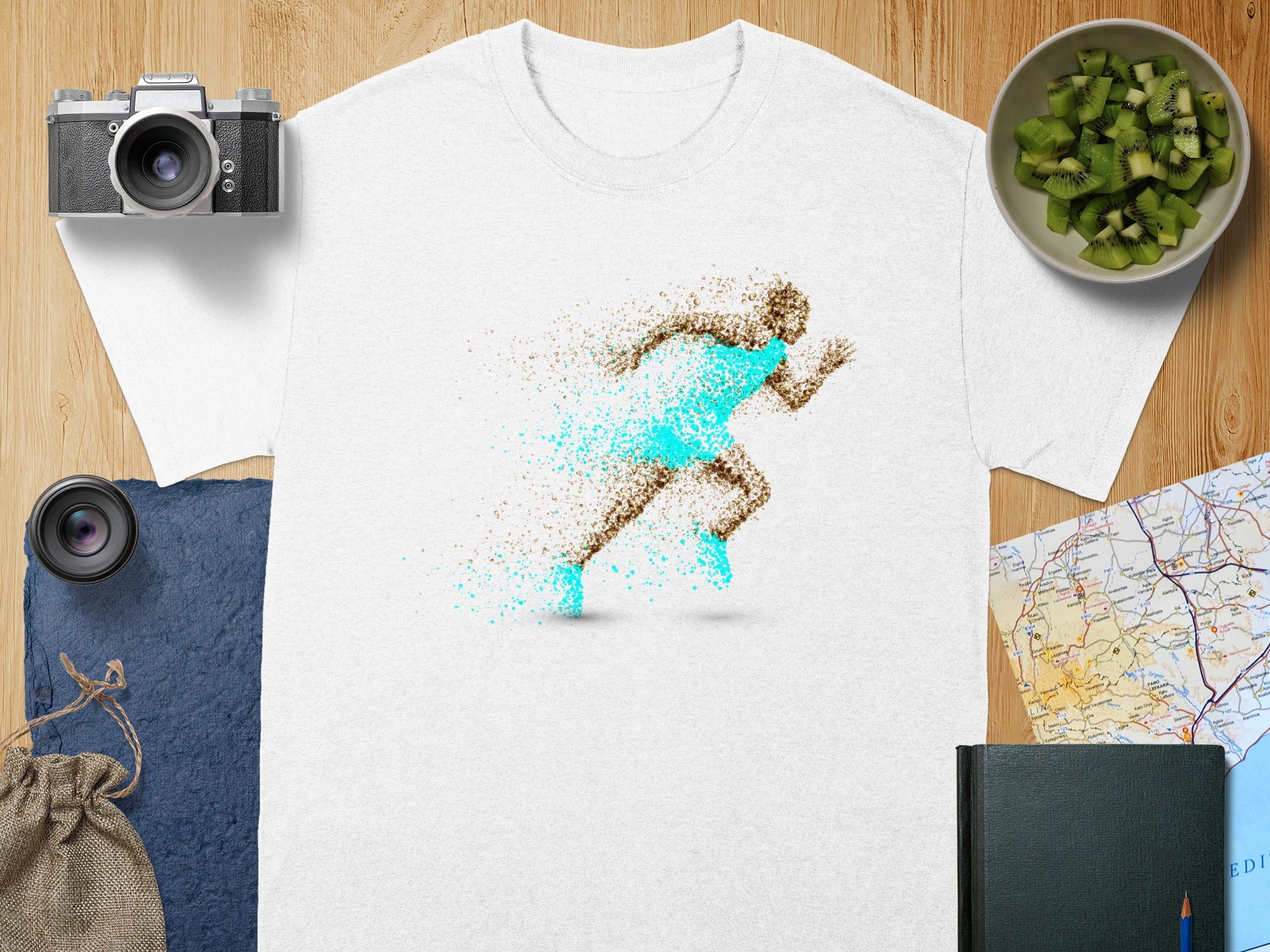 White t-shirt with a dissolving runner graphic in brown and turquoise.