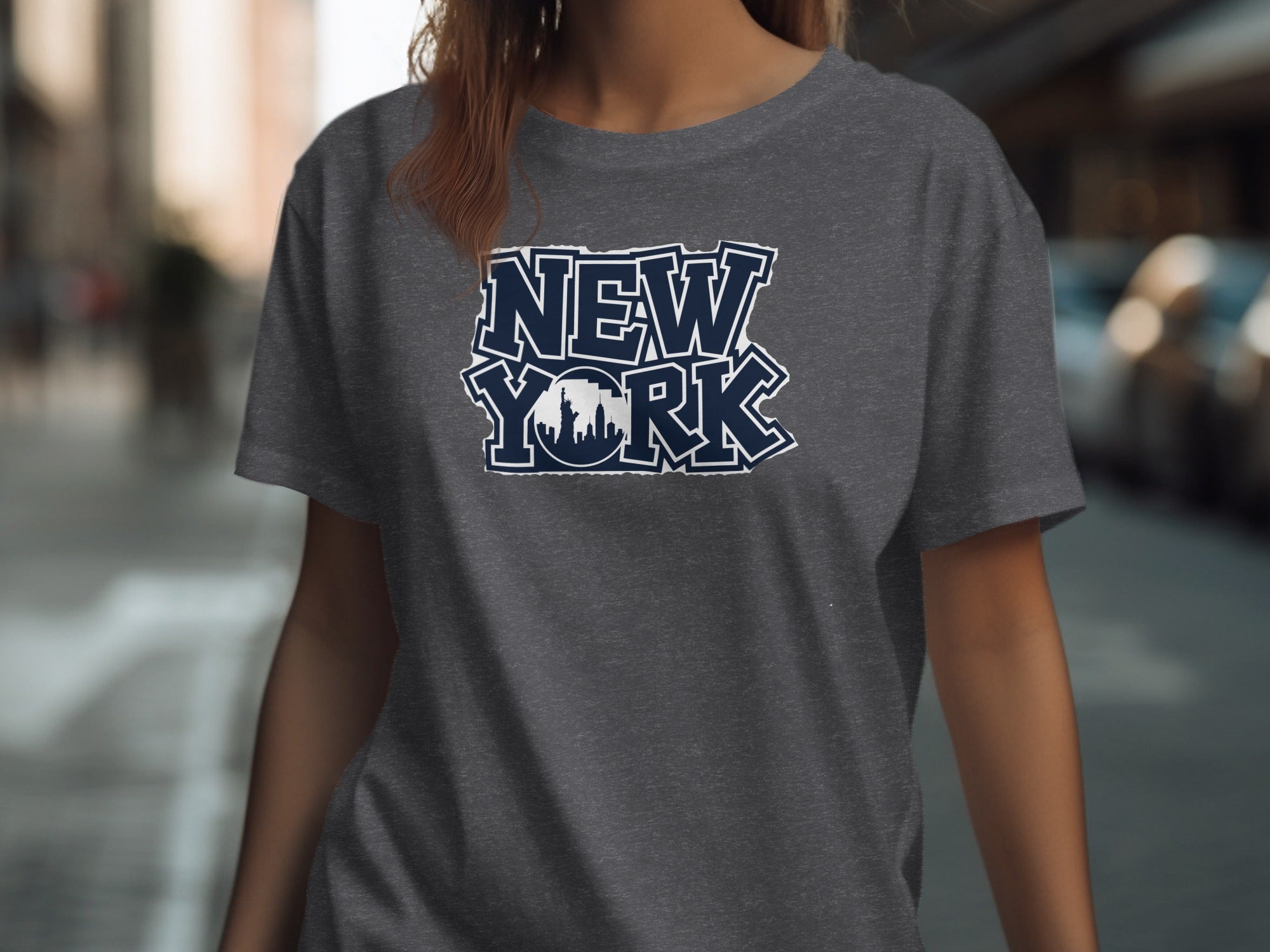 Dark grey t-shirt with white and navy "New York" text and skyline graphic.
