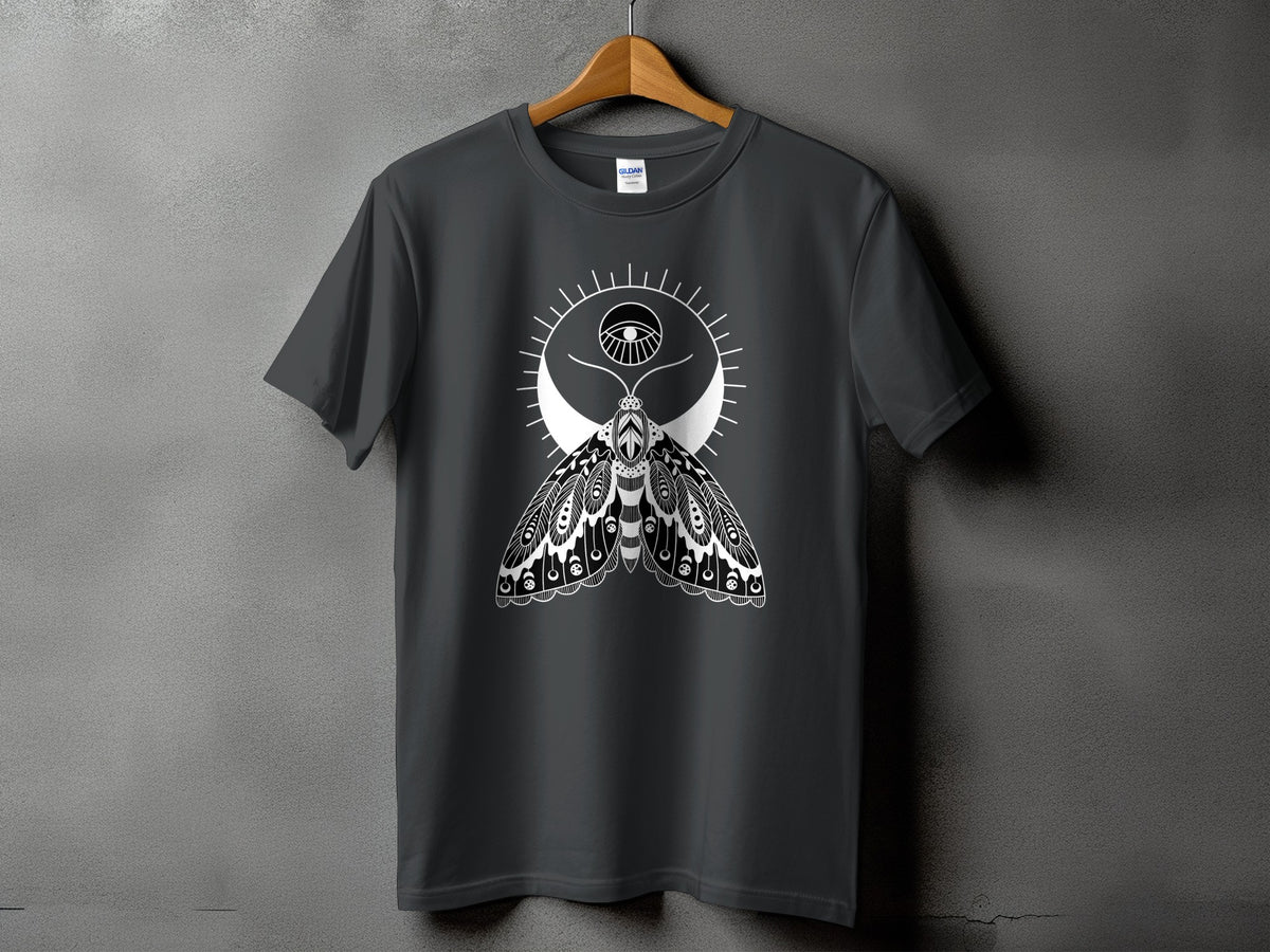 Dark grey t-shirt with a white moth design, moon, and eye.