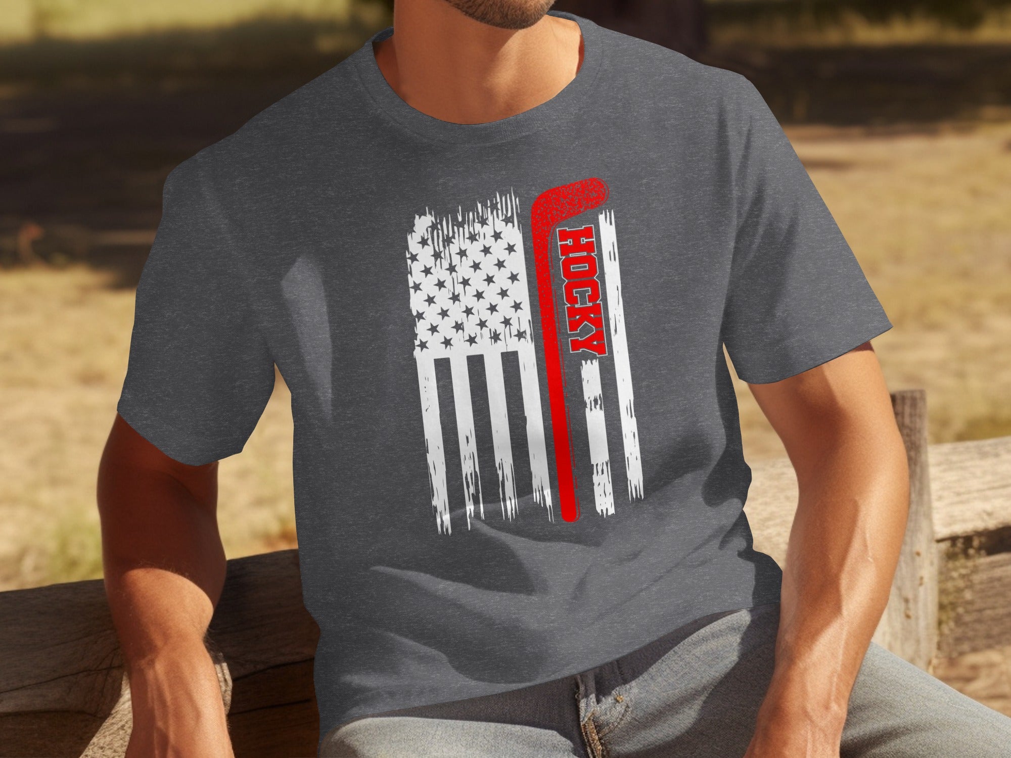Men's dark gray t-shirt with distressed American flag and red hockey stick graphic.