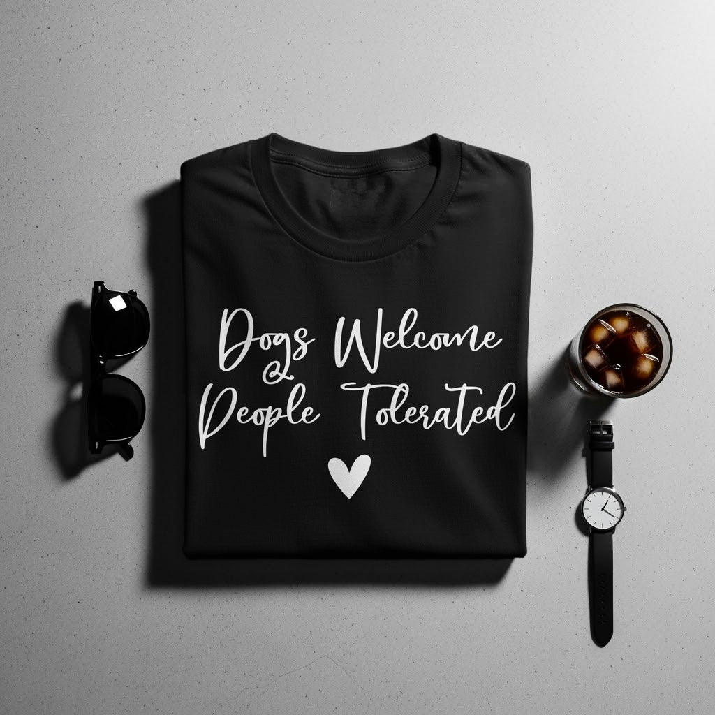 Black t-shirt with white text "Dogs Welcome, People Tolerated" and a heart.