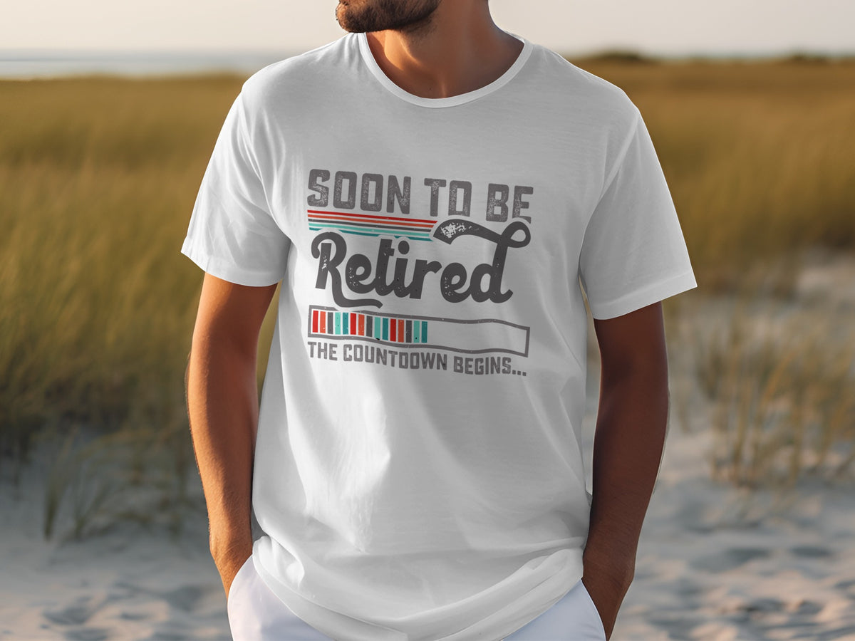 White t-shirt with text "Soon to be Retired" and a progress bar.
