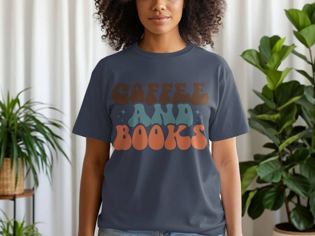 Dark blue t-shirt with text that reads "COFFEE AND BOOKS" in retro font.