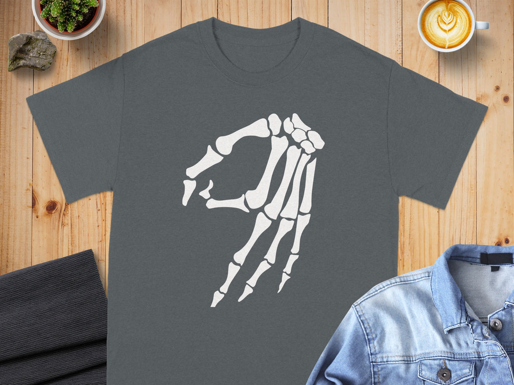 Dark grey t-shirt with white skeleton hand gesture graphic.