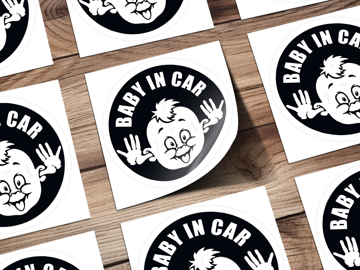 Baby in Car stickers with cartoon baby design on wooden surface