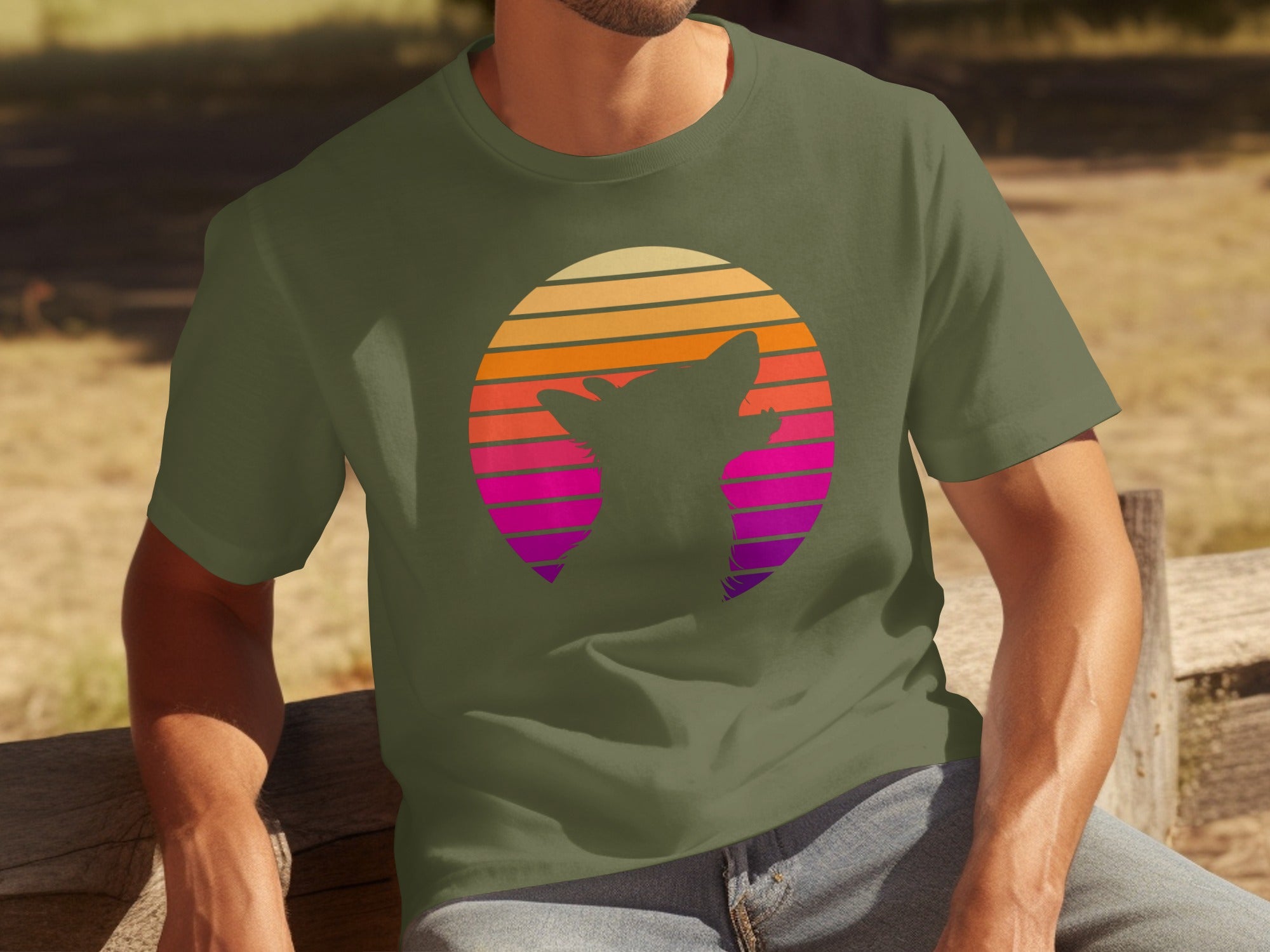 Green t-shirt with a silhouette of a dog against a retro striped sunset circle.