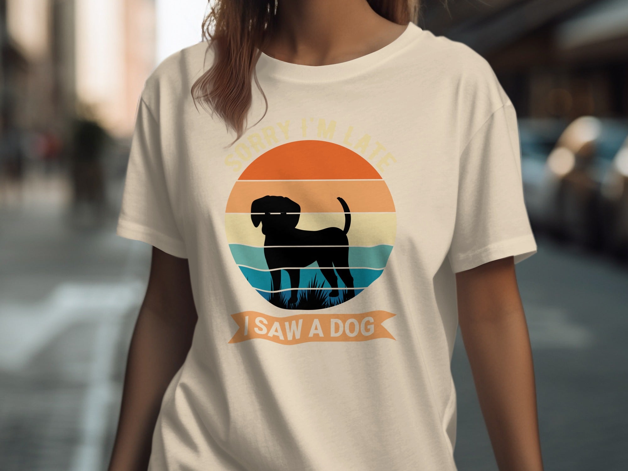Light cream t-shirt with a circular graphic featuring a black dog silhouette and text.