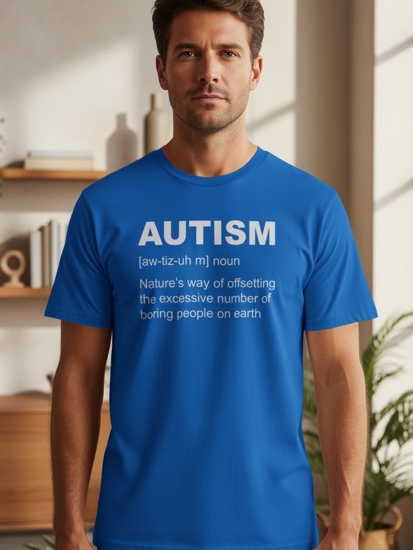 Blue t-shirt with white text: AUTISM, definition, and humorous quote.