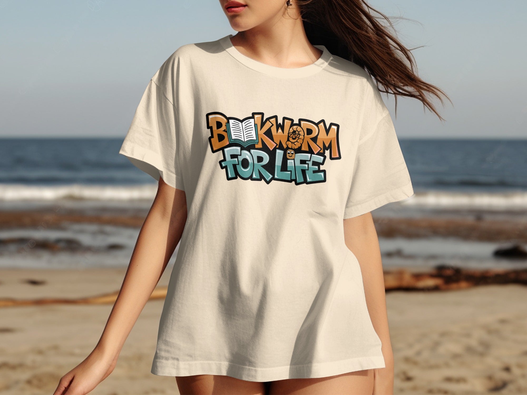Cream t-shirt with "Bookworm For Life" text and illustrations of a book and worm.