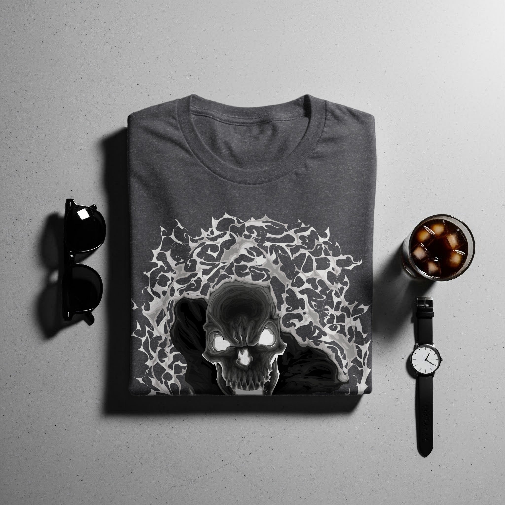 Dark grey t-shirt with a skull and fiery abstract design.