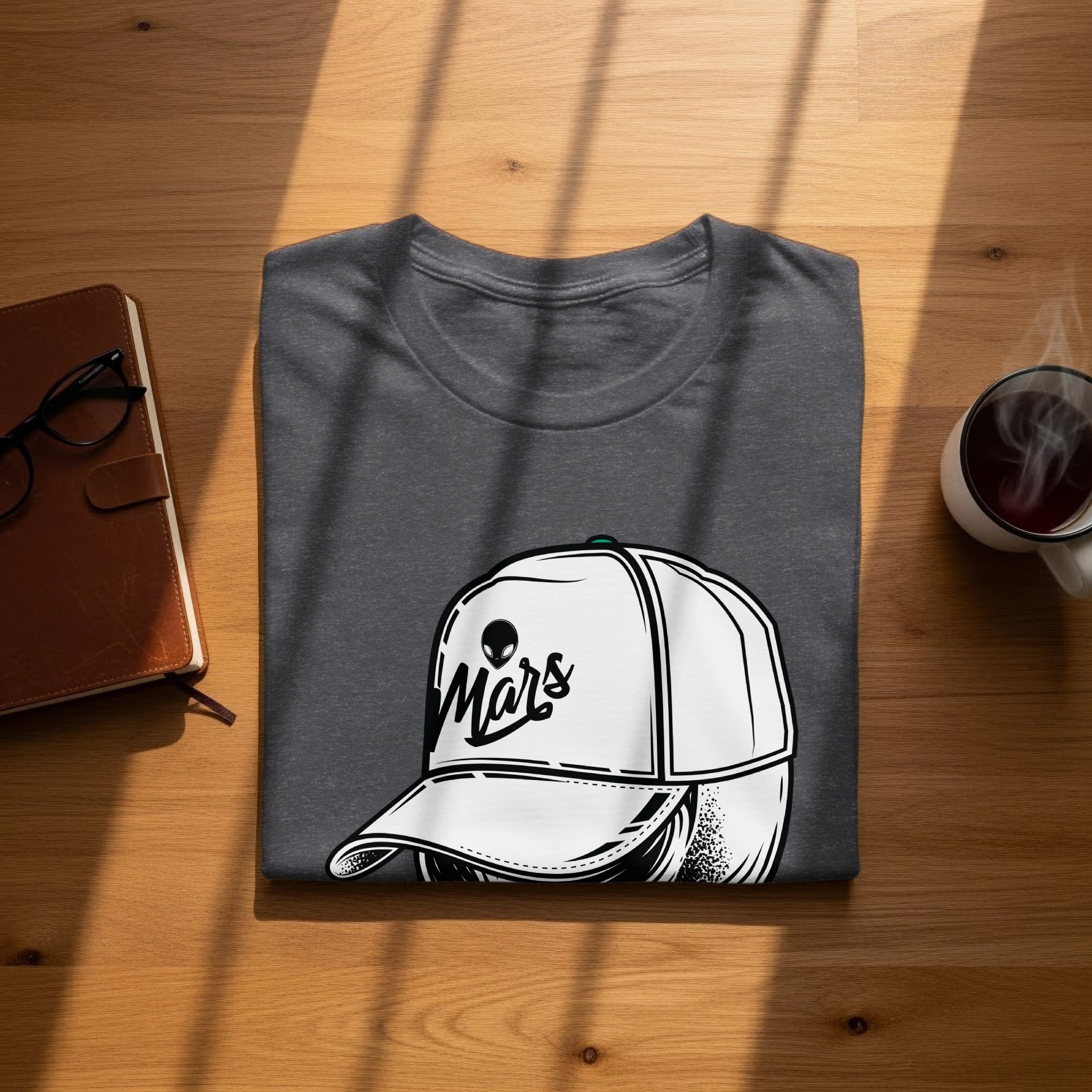 Dark grey t-shirt with a white cap graphic featuring an alien head and "Mars" text.