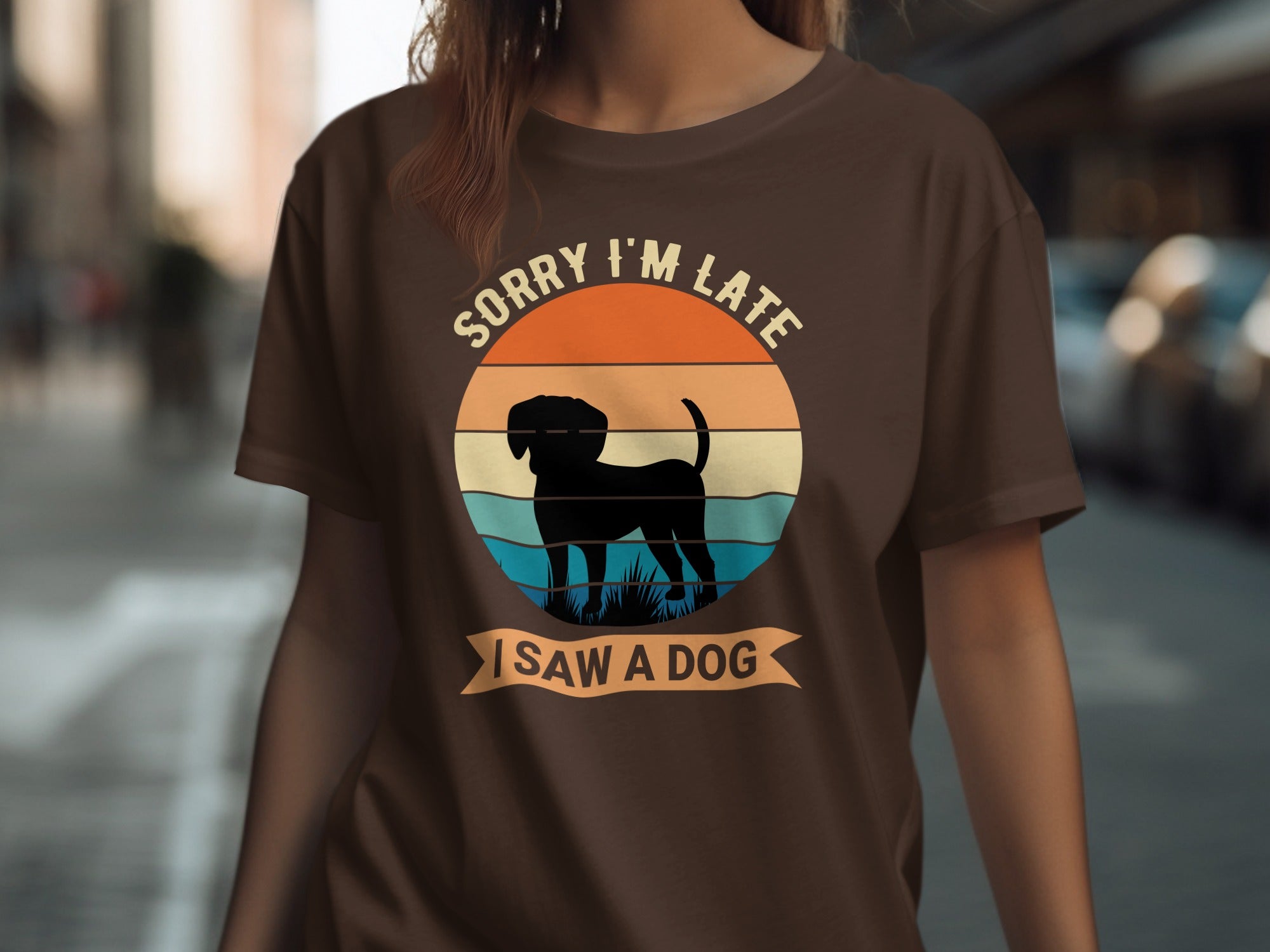 Brown t-shirt with "Sorry I'm Late" and dog silhouette graphic.